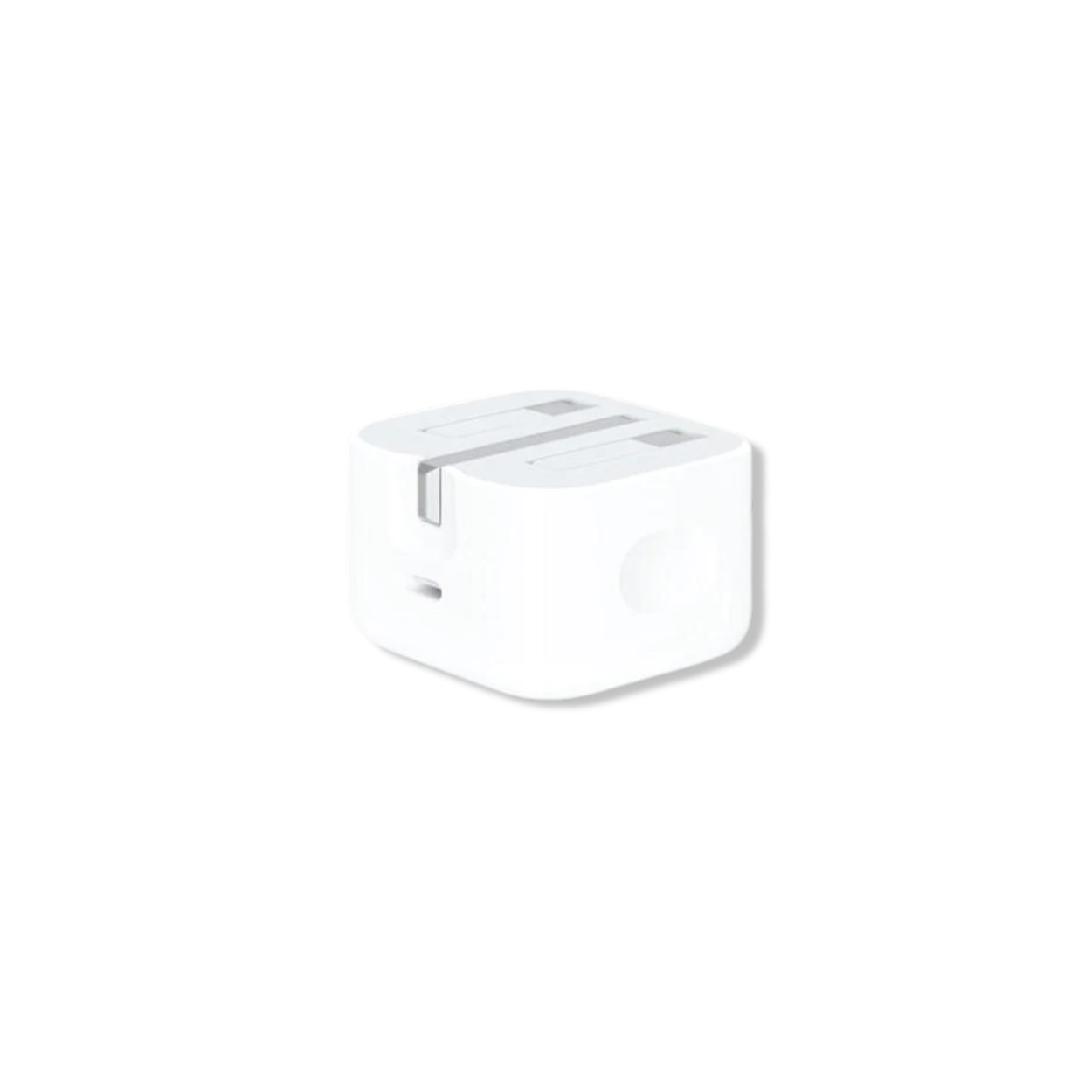Apple 20W USB-C Power Adapter on desk next to iPhone and cable